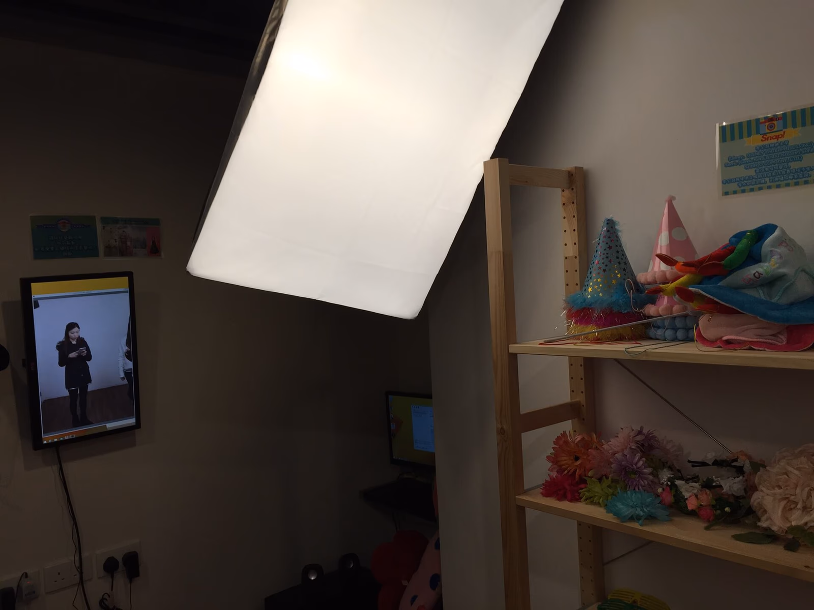 Studio lighting equipment positioned for a portrait