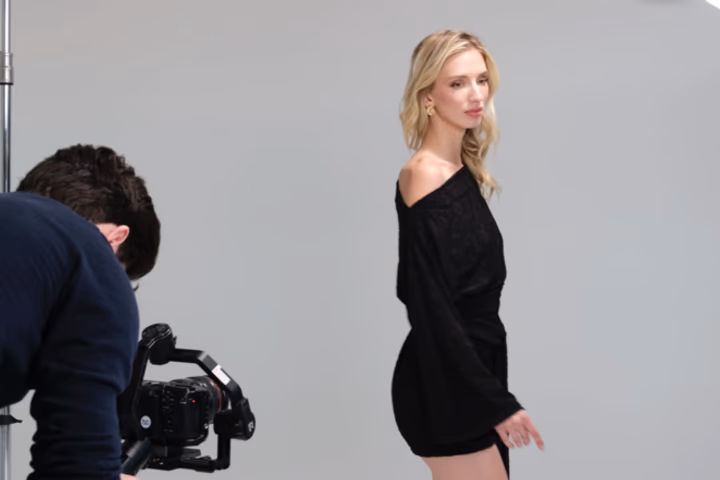 Portrait session with camera and model in studio