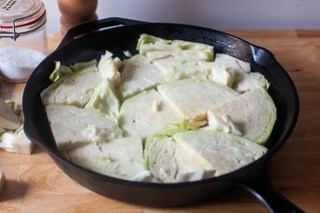 Roasted chicken served with cabbage cooked in chicken fat