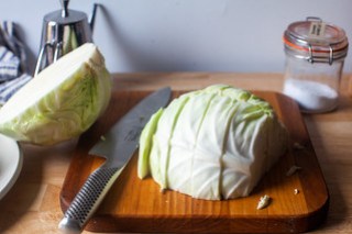 Roasted chicken served with cabbage cooked in chicken fat